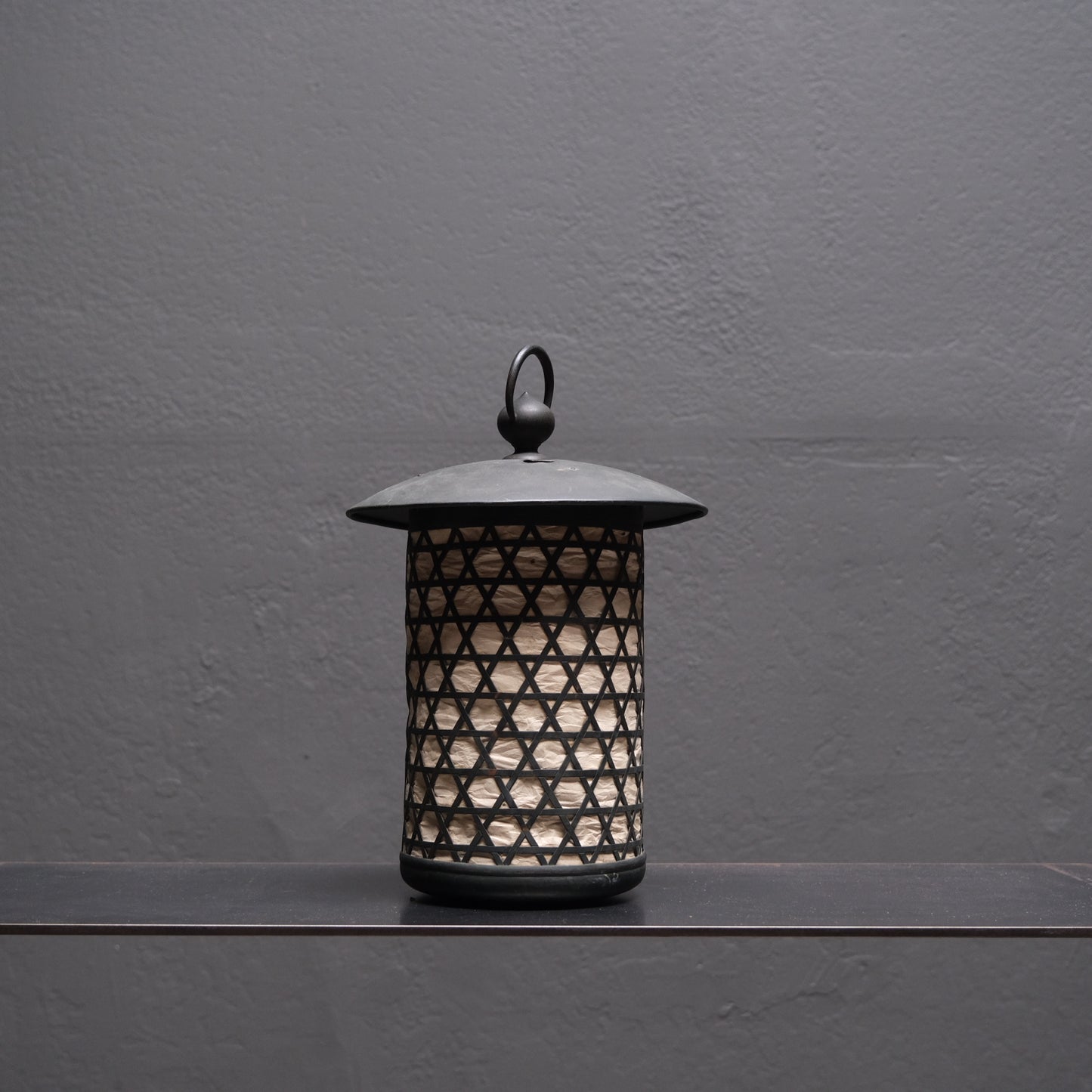 Detail of hidden venting beneath rim on Japanese hexagonal lattice lantern