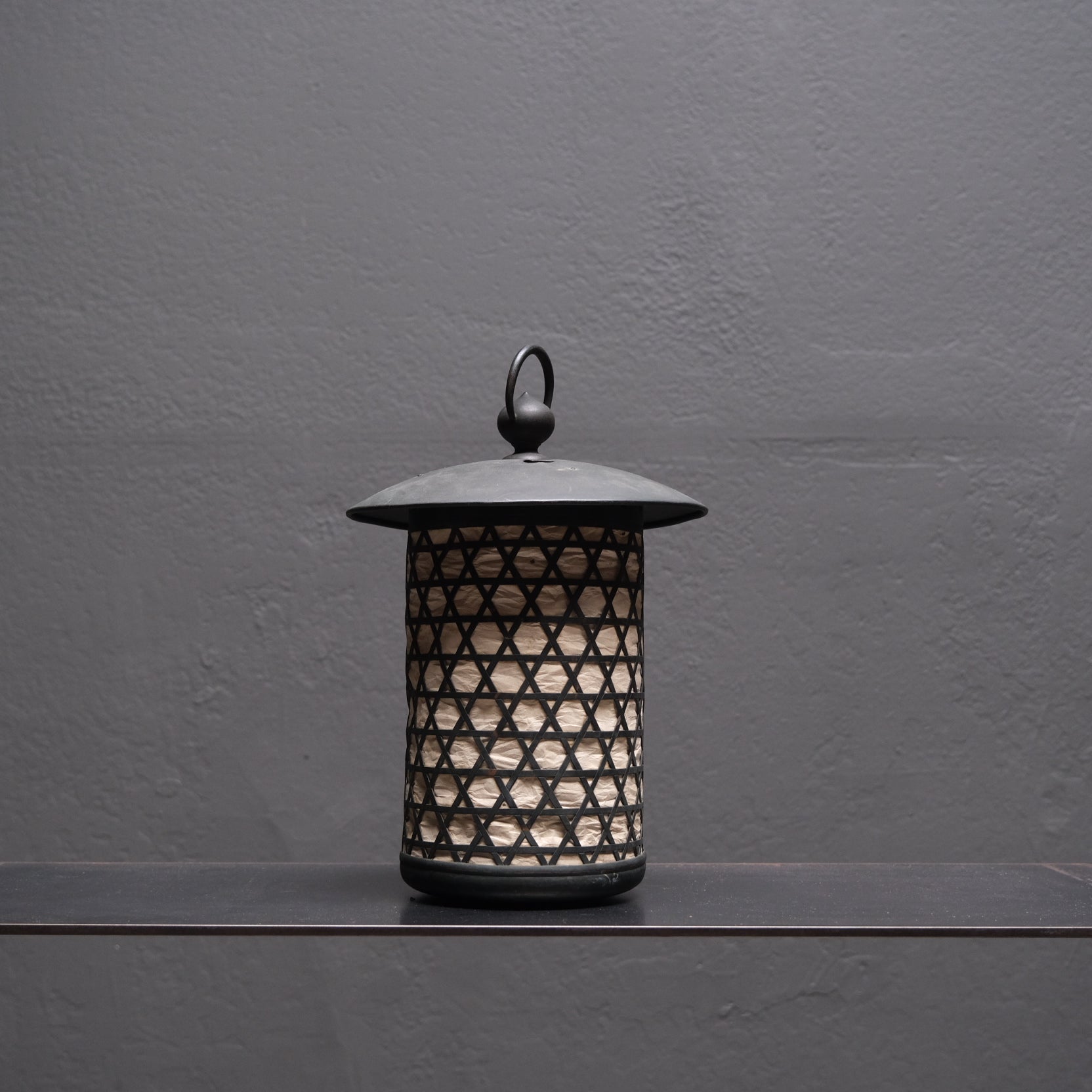 Detail of hidden venting beneath rim on Japanese hexagonal lattice lantern
