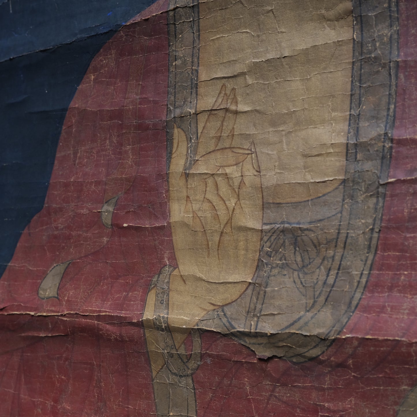 Detail of seated meditative posture on 18-19th century Korean Buddha scroll