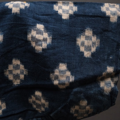 Detail of patched cloth collage on Japanese indigo noragi work jacket
