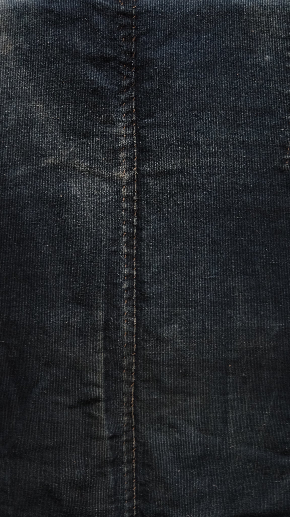 Hem and lower edge of Japanese noragi work kimono showing pieced indigo cotton