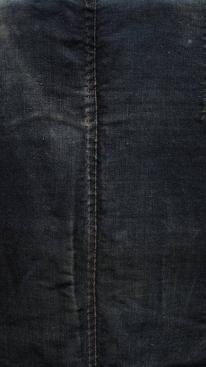 Hem and lower edge of Japanese noragi work kimono showing pieced indigo cotton