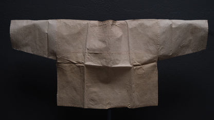 Damage and tear detail on Edo period Japanese kamiko paper undershirt