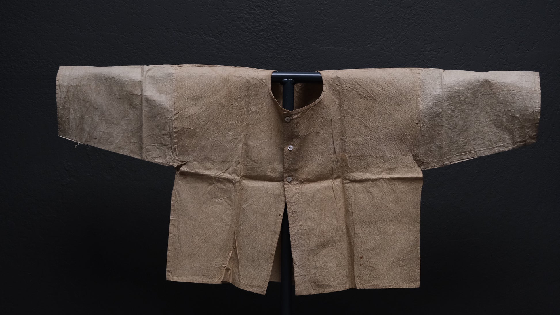 Close-up of bast fiber neck reinforcement on Japanese kamiko paper garment