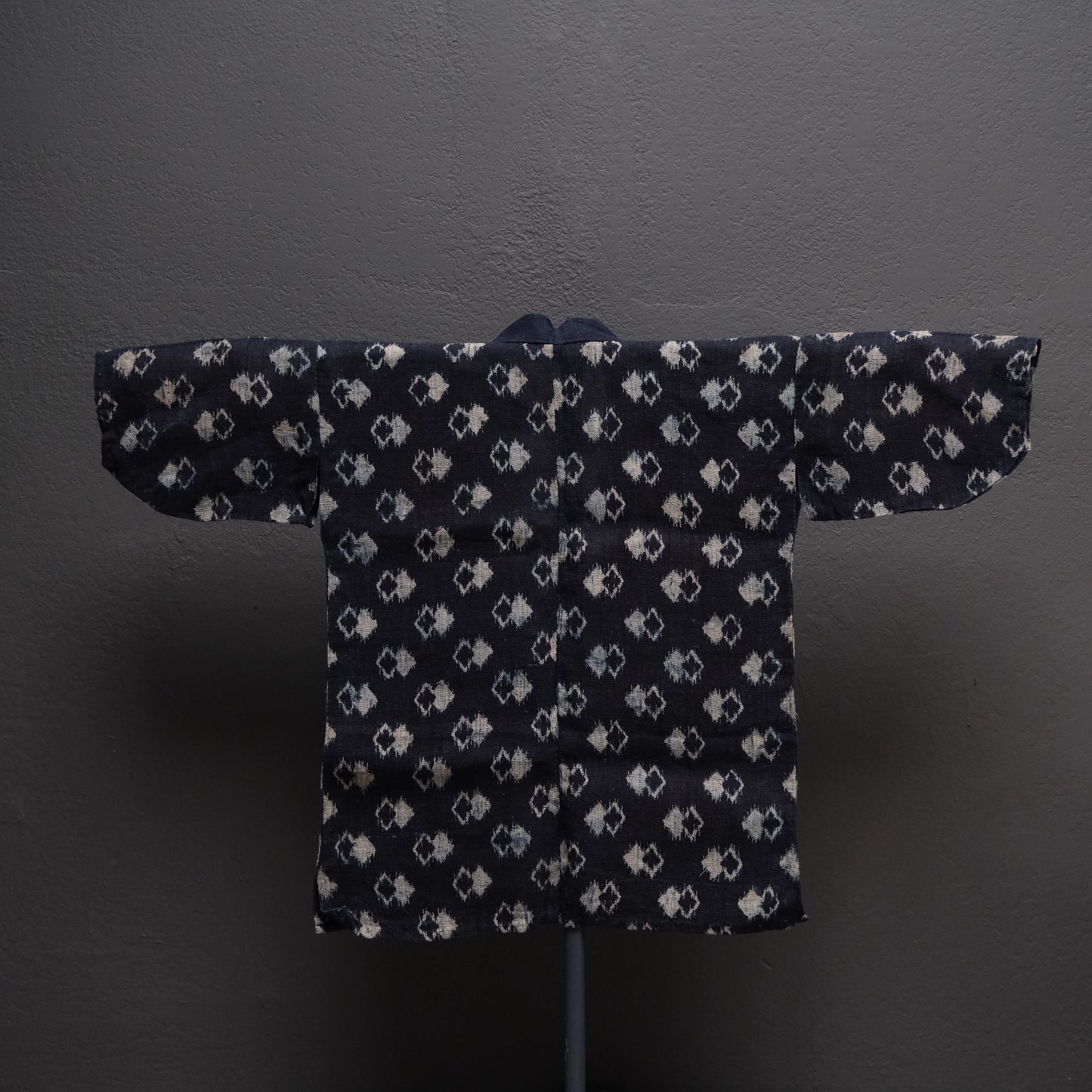 Full spread of Japanese double ikat robe showing woven design