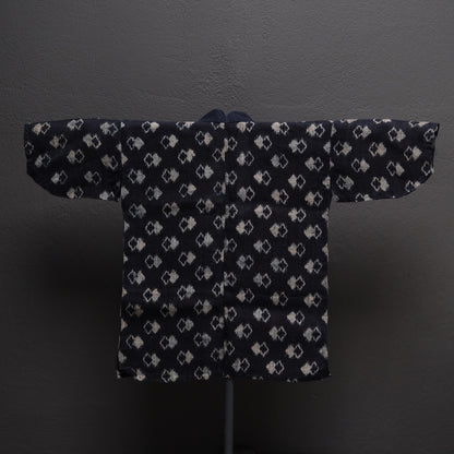 Japanese double ikat woven robe close-up of geometric pattern