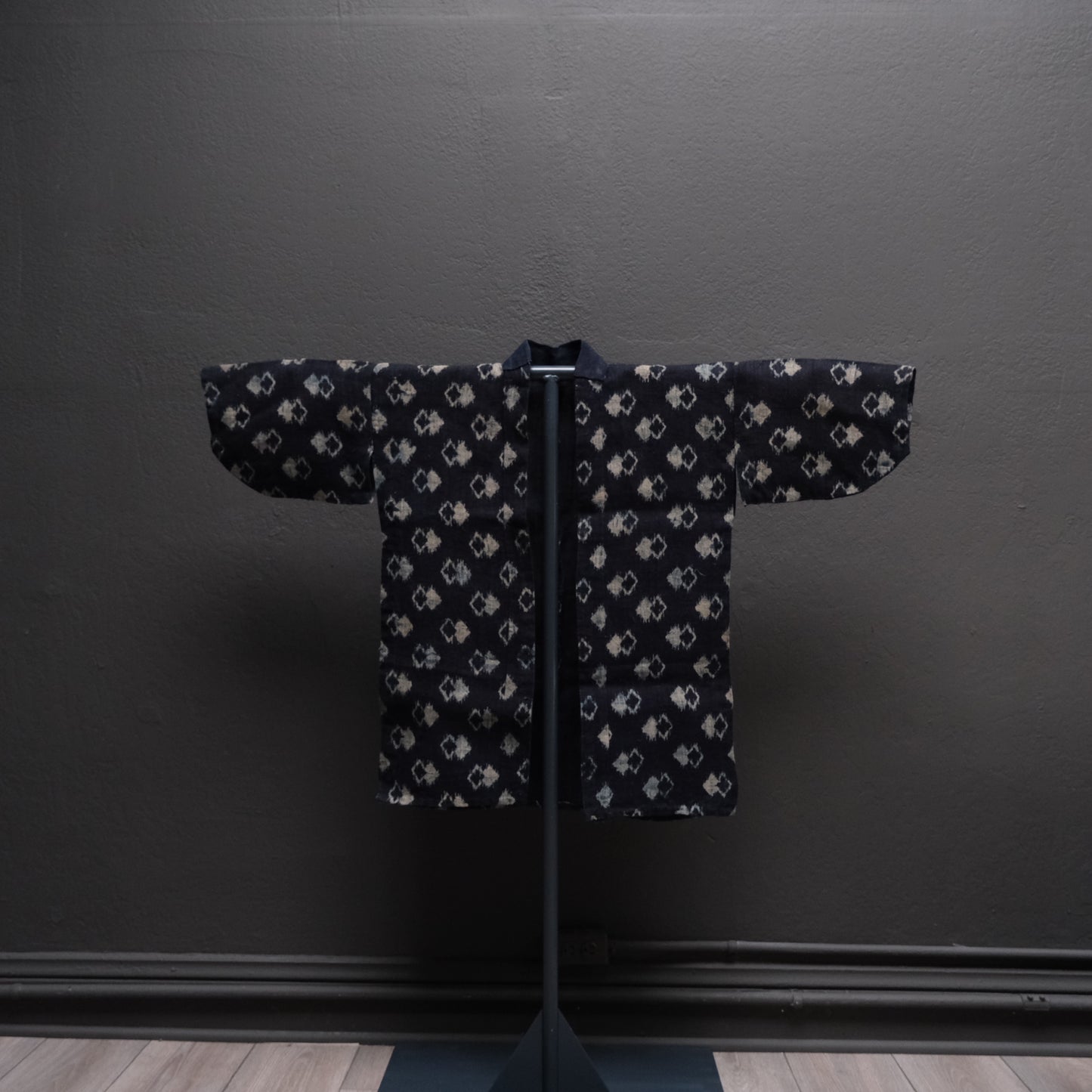 Detail of double ikat weaving technique on Japanese geometric patterned robe