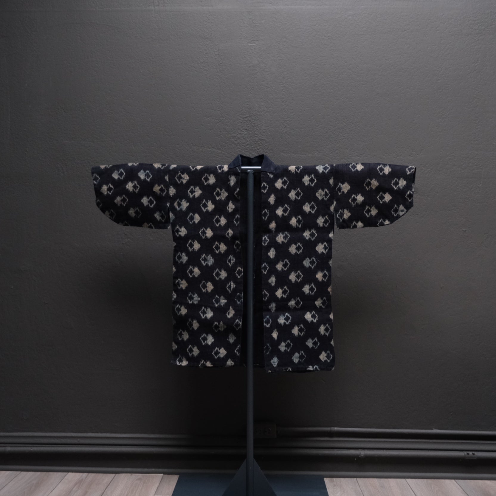 Detail of double ikat weaving technique on Japanese geometric patterned robe