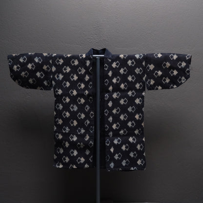 Japanese double ikat woven robe with geometric pattern, Okinawan tradition