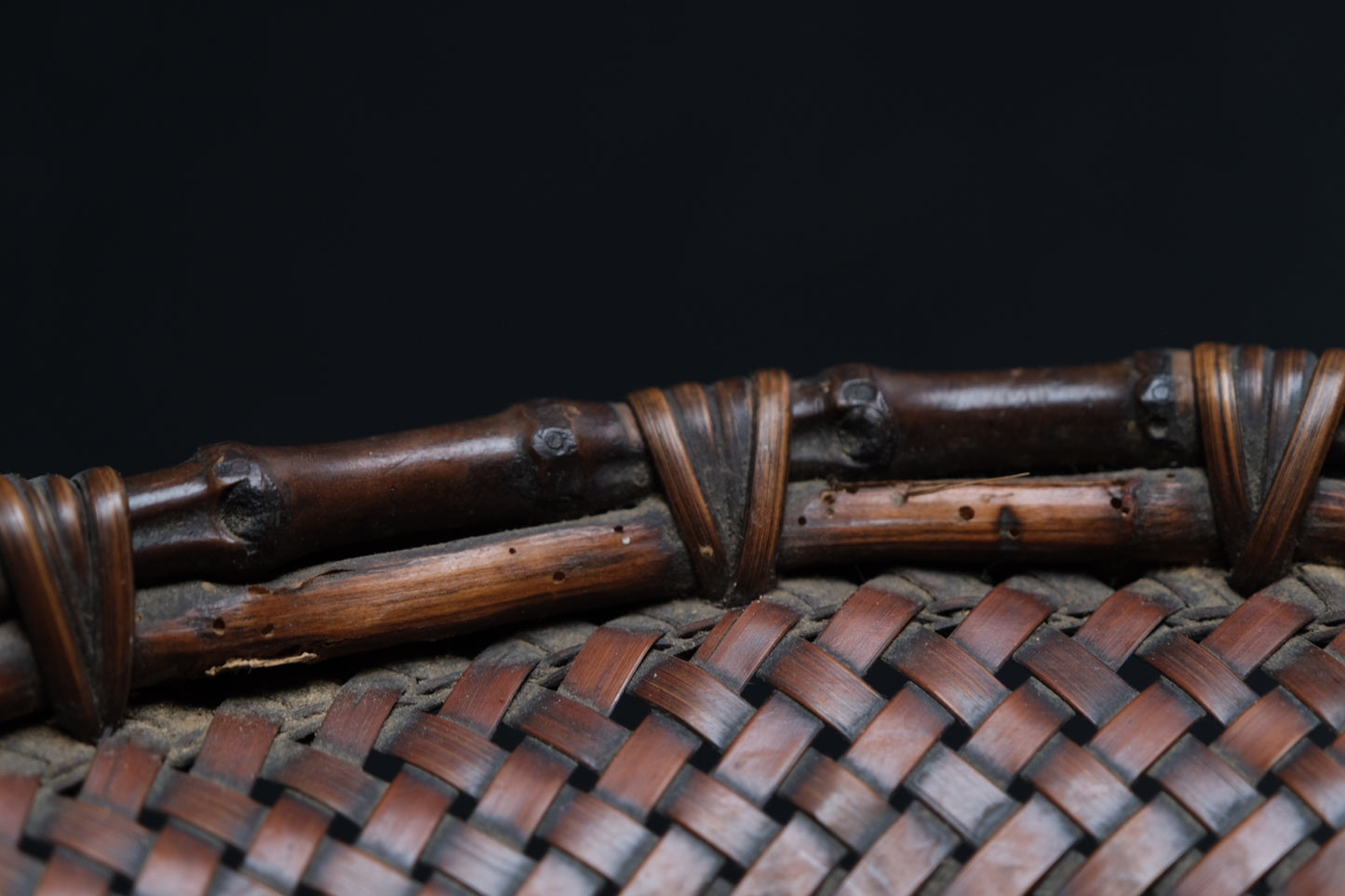 Detail of twill weave transition on inner sides of fine bamboo flat basket