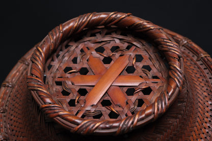 Interior of fine Japanese bamboo flat basket showing plaiting variation