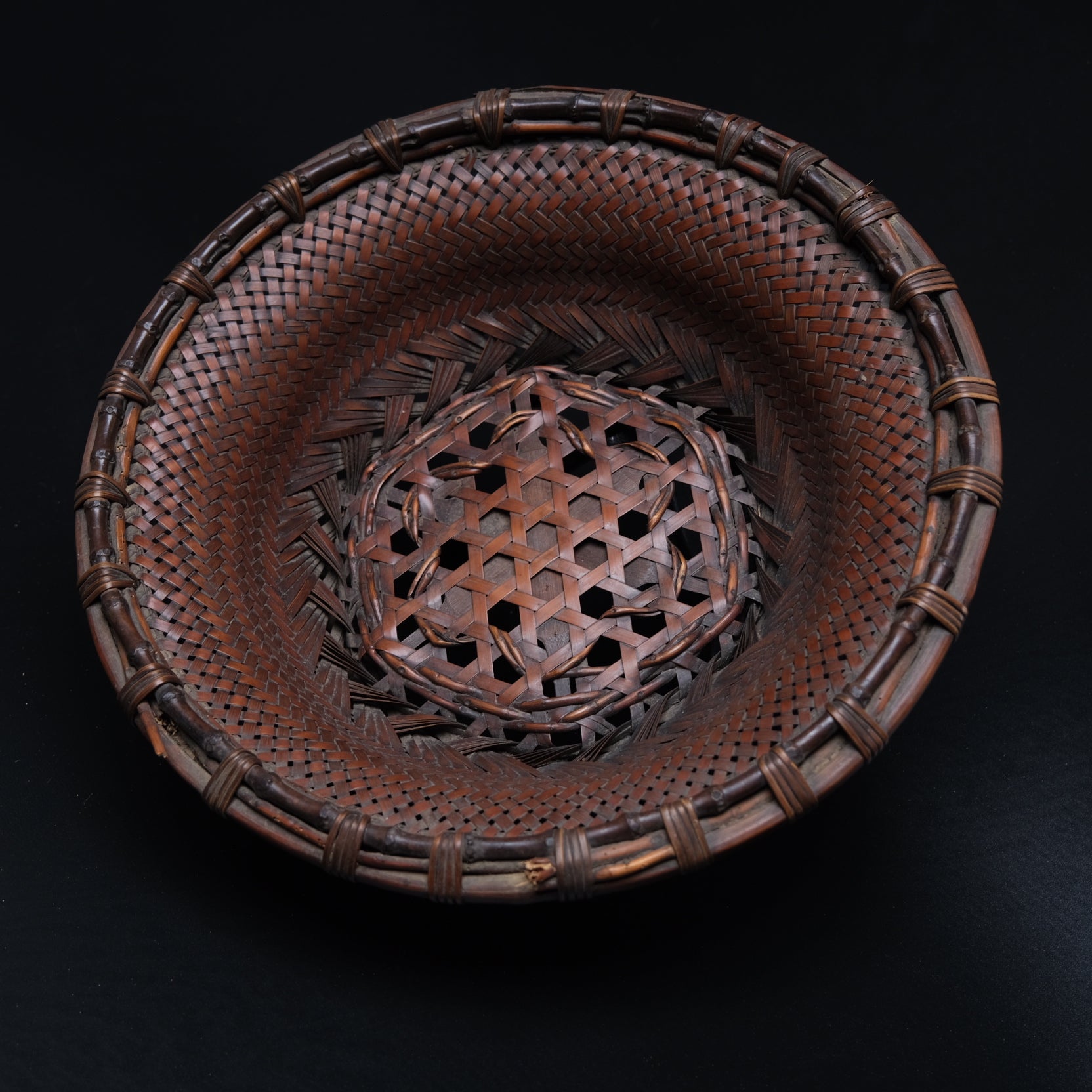 Japanese bamboo basket with folk construction and natural patina