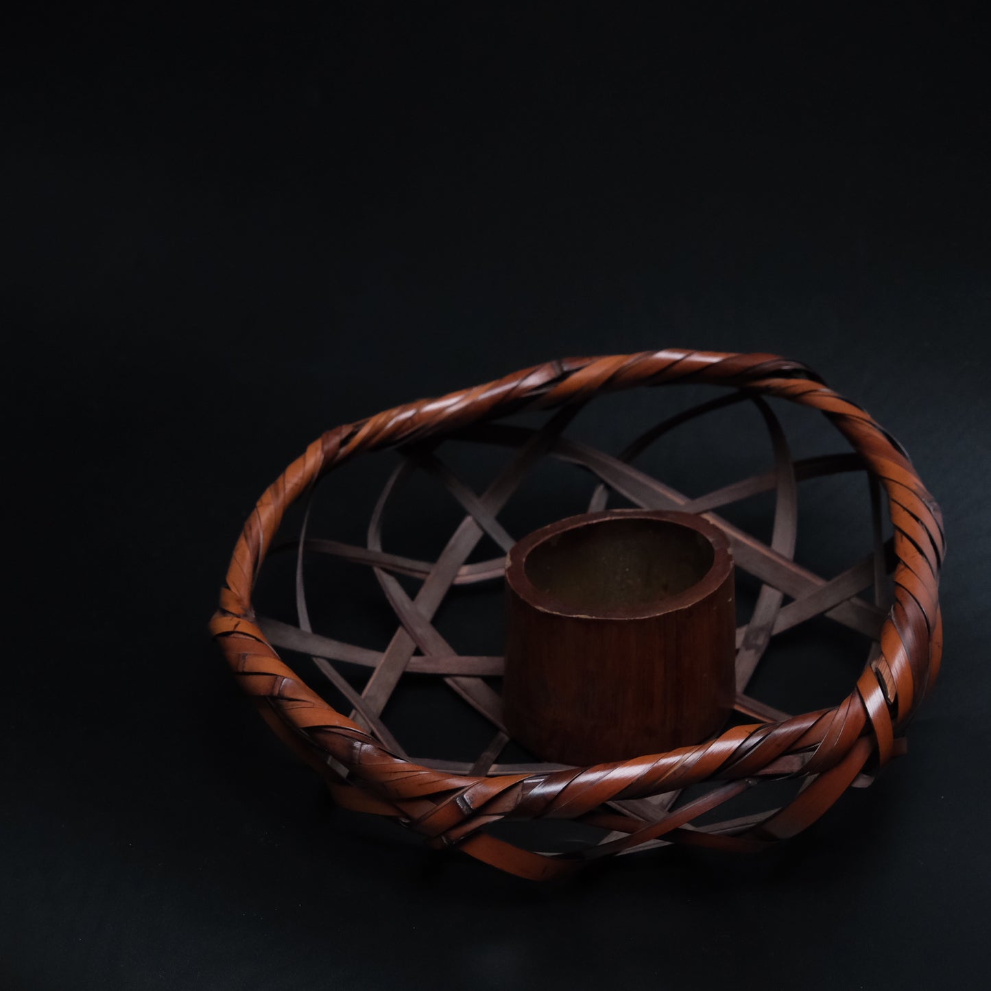 Japanese bamboo basket with woven open weave and handle