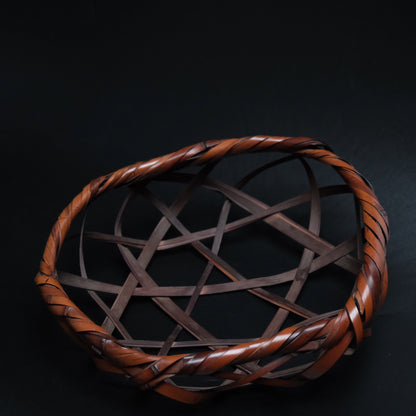 Japanese madake bamboo basket side view showing double-plaited hexagonal weave