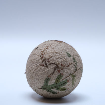 Detail of emerald thread and geometric pattern on early Meiji temari ball