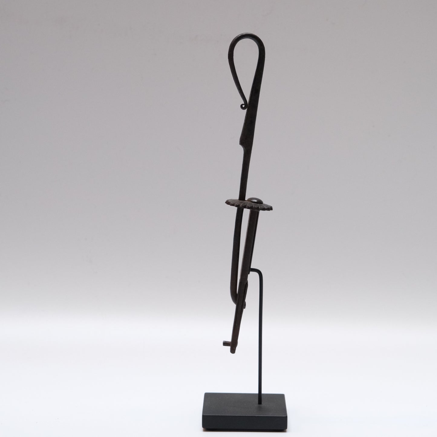 Detail of forged iron construction on Japanese tansu lock with chrysanthemum