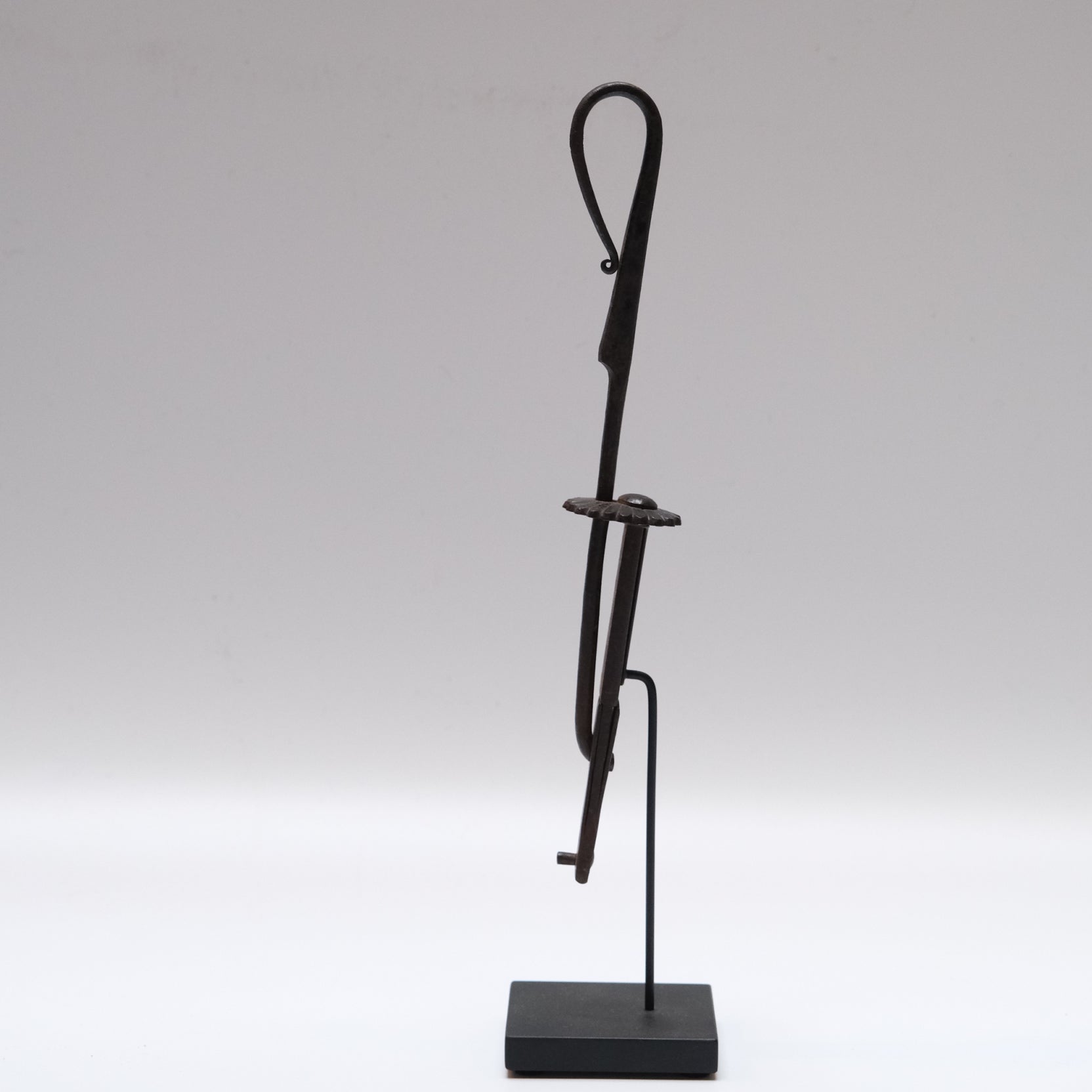 Detail of forged iron construction on Japanese tansu lock with chrysanthemum