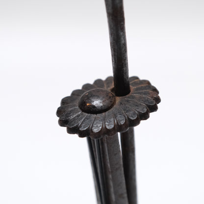 Alternate angle of Edo period Japanese iron kiku tansu lock on metal stand