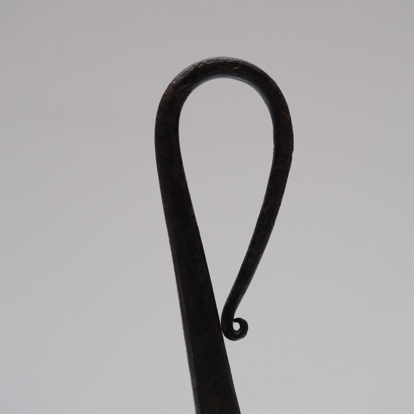 Side view of Japanese forged iron chrysanthemum tansu lock, 12.5-inch height