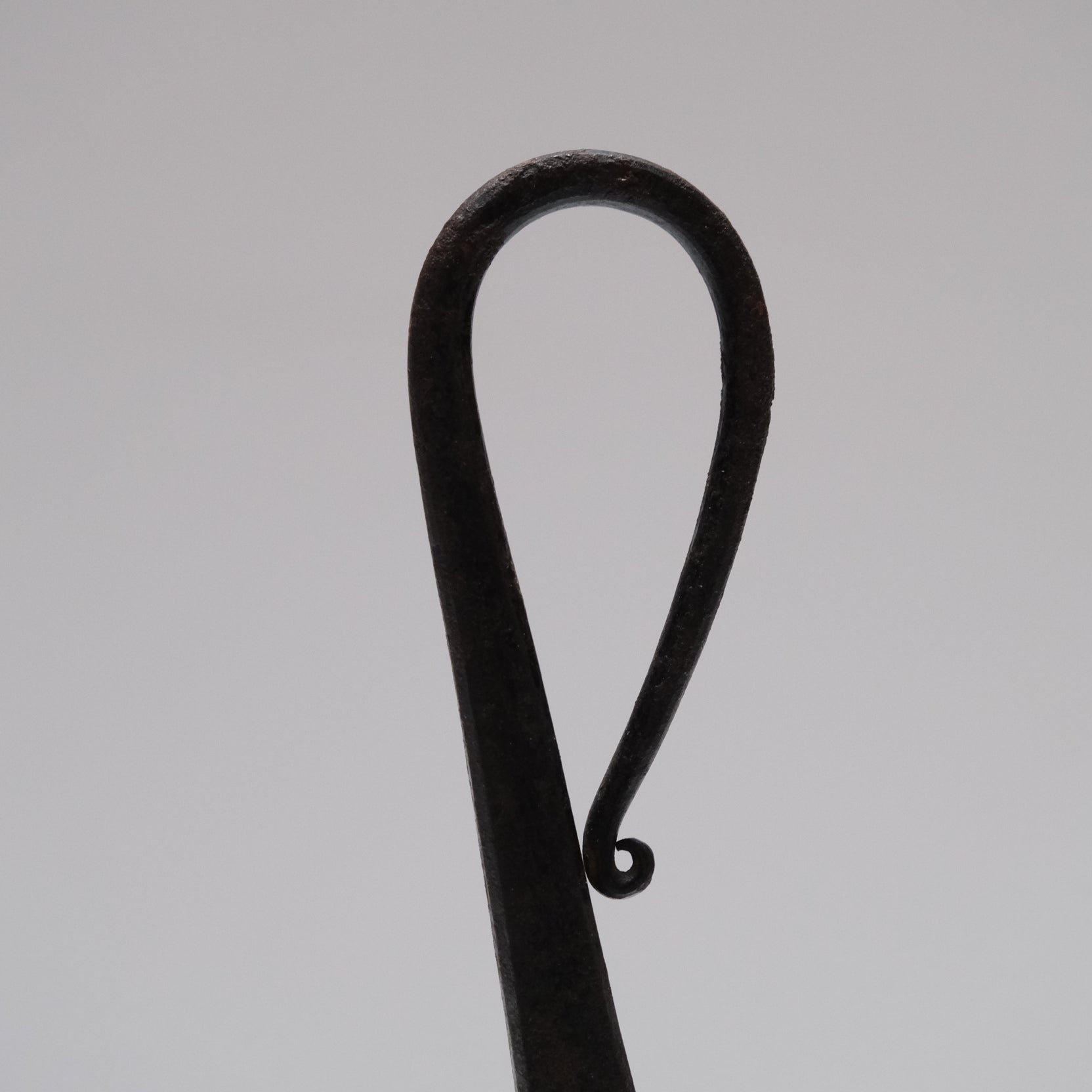 Side view of Japanese forged iron chrysanthemum tansu lock, 12.5-inch height