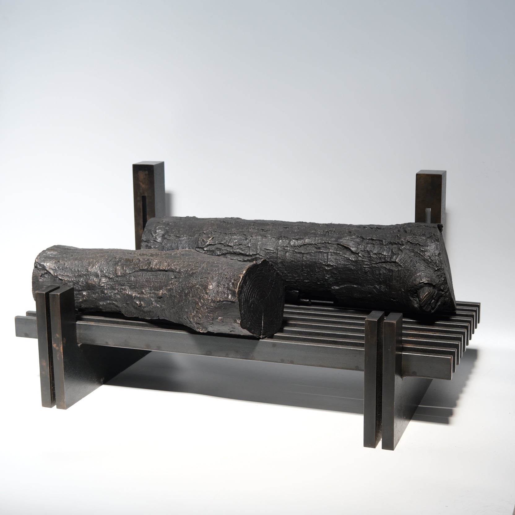 Fireplace grate close-up showing iron construction and form