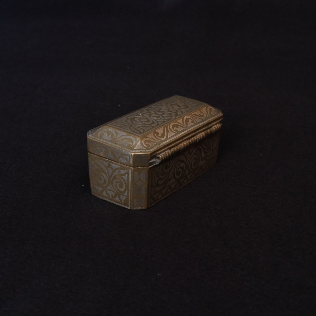 Maranao brass betel nut box engraved with silver-inlaid okir scrollwork, view 4 of 10