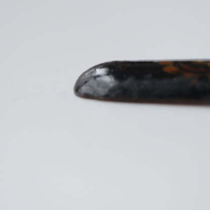 Ainu ikupasuy prayer stick in black lacquer painted with scrolling stems, red commas and gold rosettes, view 9 of 12
