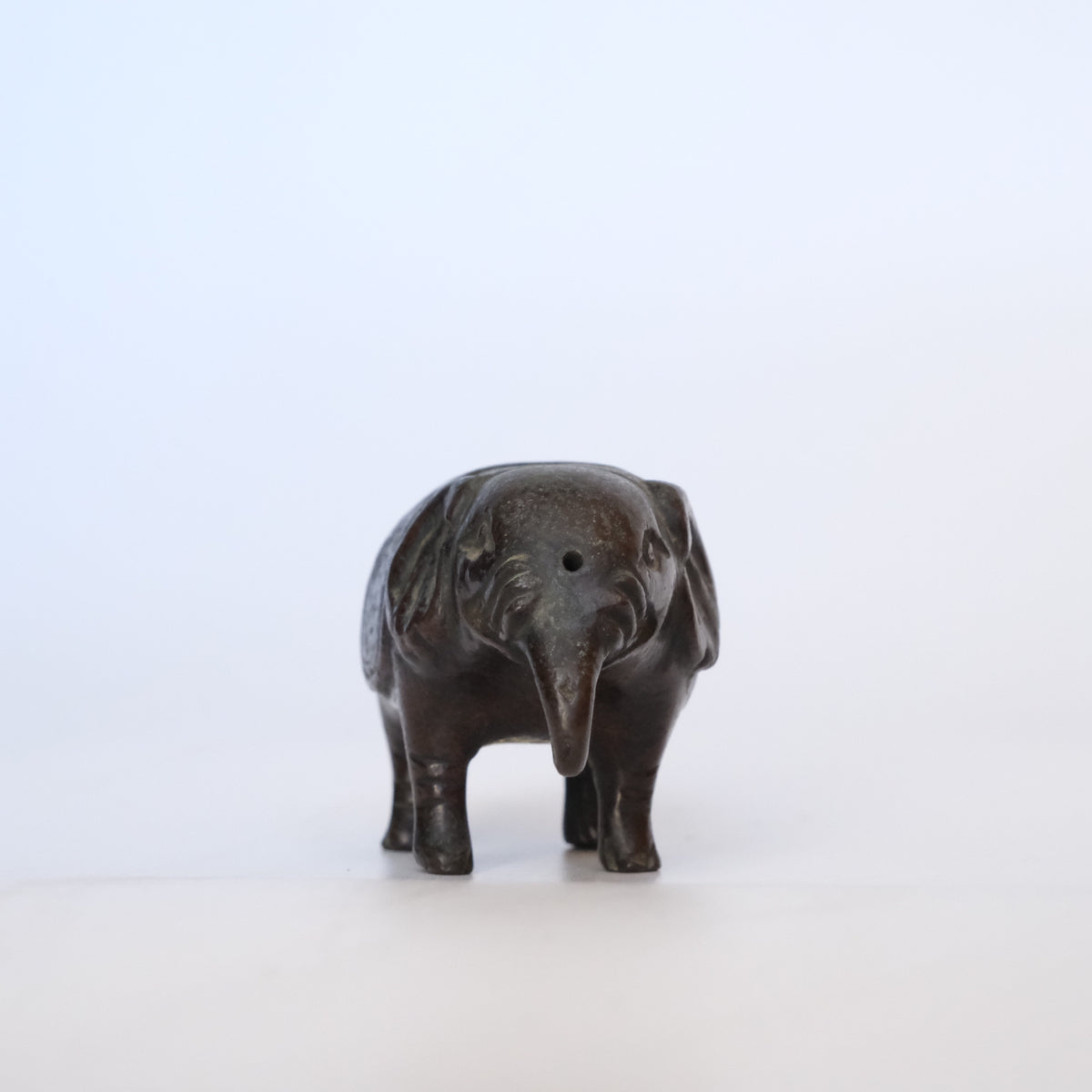 Small cast bronze elephant water dropper (suiteki) with incised caparison, view 6 of 8