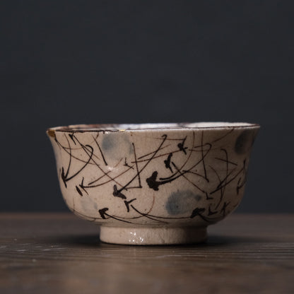 Kyo-yaki bowl with brushed susuki grass design and gold kintsugi repairs, view 2 of 10