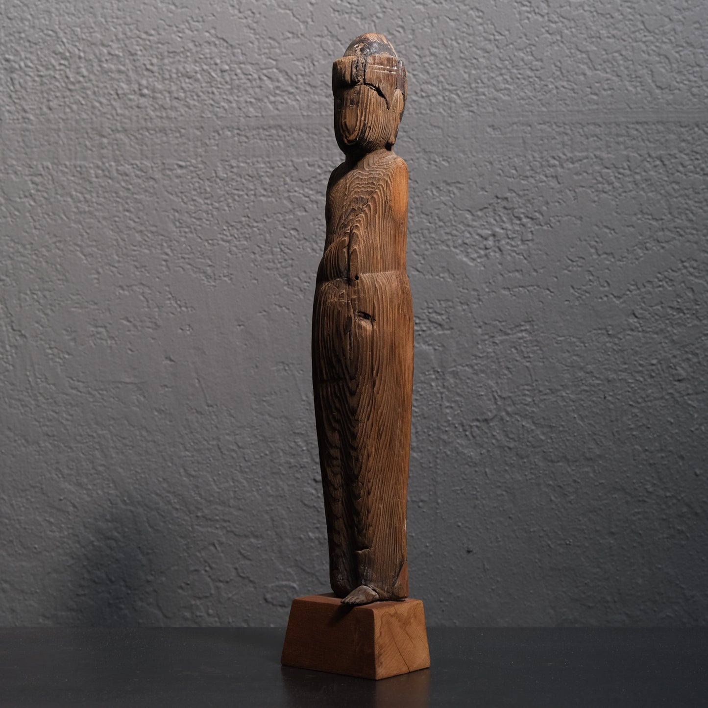 Heian/Kamakura period Kannon Bosatsu side view showing weathered carved surface