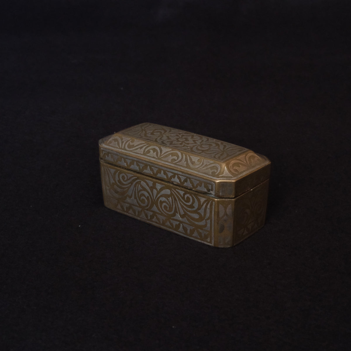 Maranao brass betel nut box engraved with silver-inlaid okir scrollwork, view 3 of 10