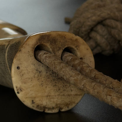 Full view of Edo period Japanese cow crupper, 37.5-inch length with bone beads