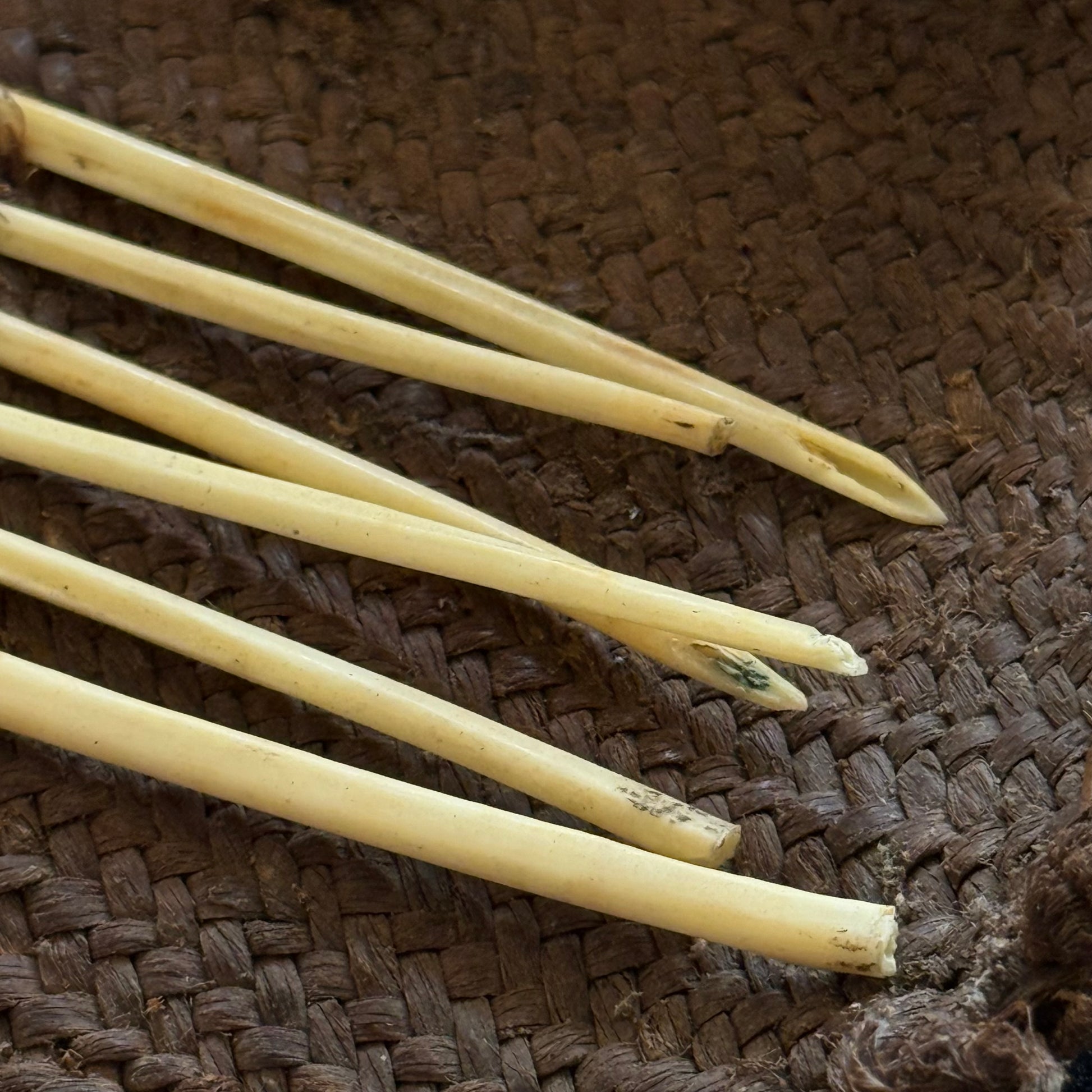 Close-up of woven pandanus fiber construction on Oceanic sewing kit case