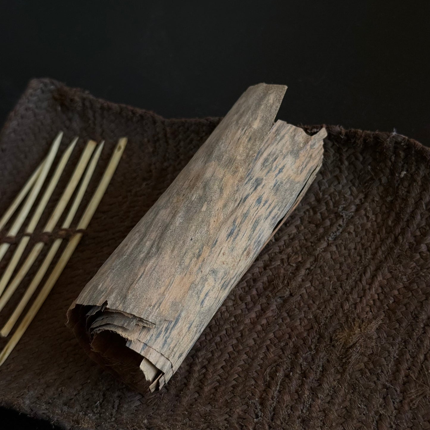 Alternate angle of Oceanic pandanus fiber sewing kit unrolled, 20x6 inches